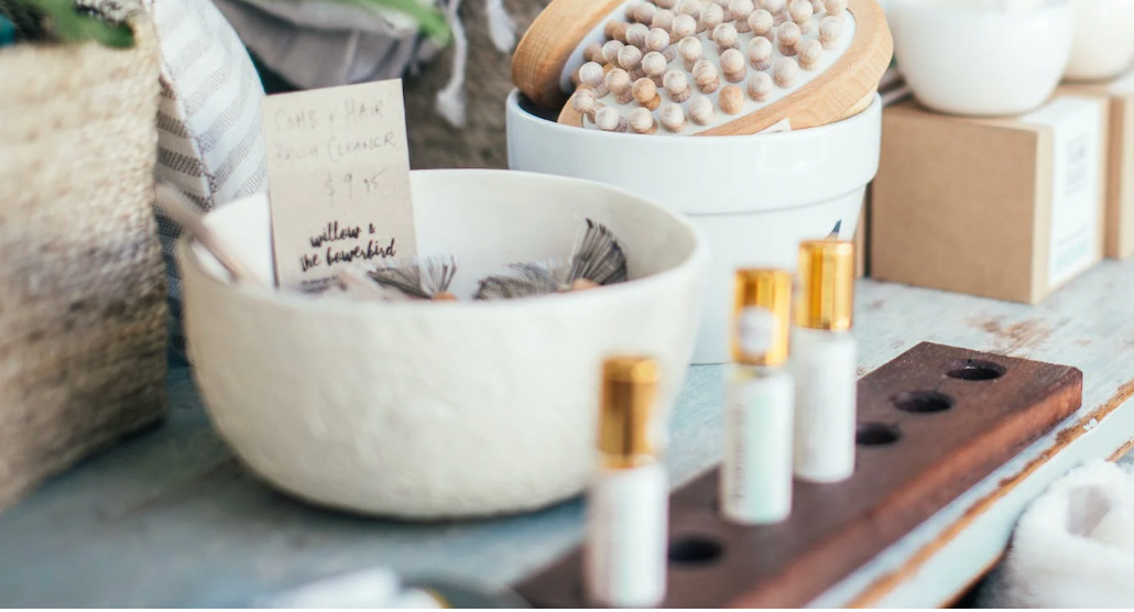 3 perfume samples placed near brushes