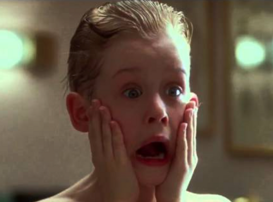 a scene from movie home alone where main character kevin mccallister has applied after shave