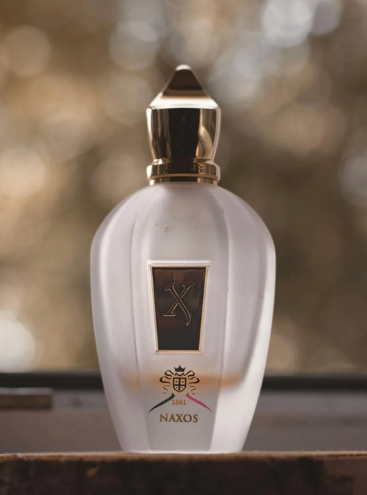 bottle of xerjoff naxos displayed outside