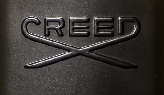 creed logo with a black background