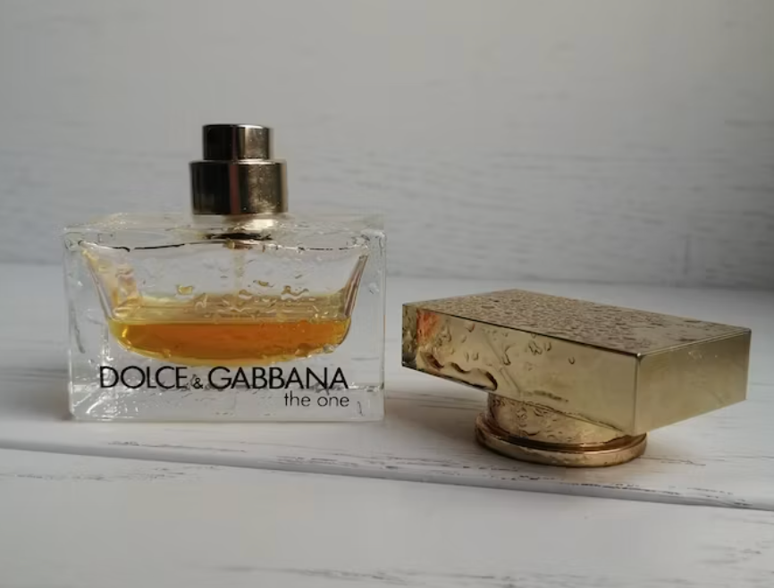 small bottle of dolce & gabbana the one perfume with cardamom note