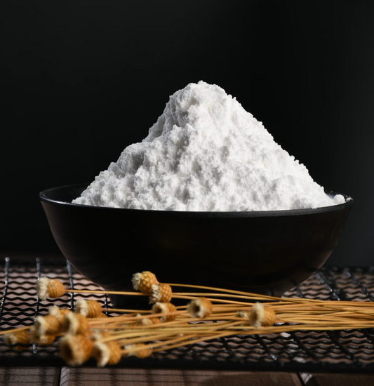 black pot filled with white powdery substance