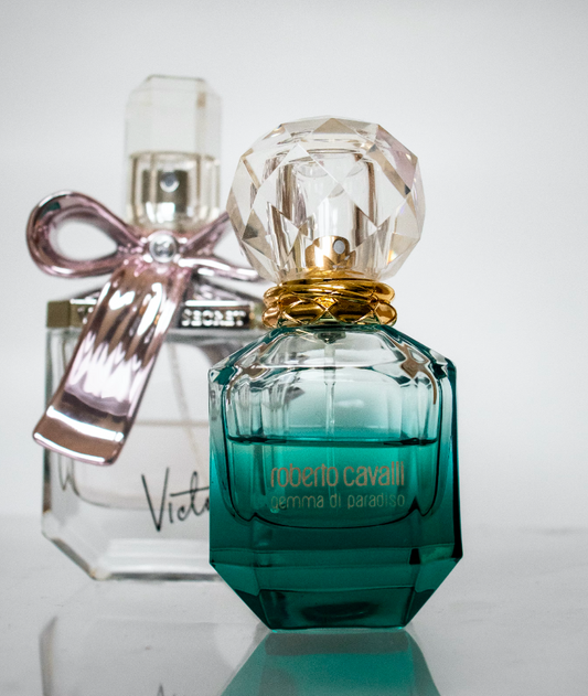 2 bottles of perfume ready to be layered
