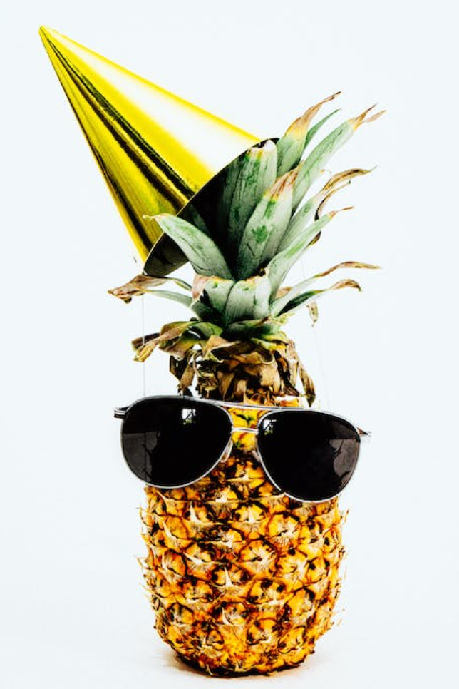 pineapple wearing aviator sunglasses