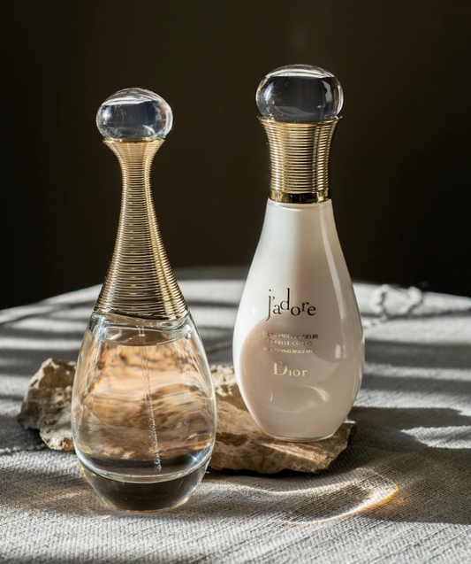 real bottle of christian dior's j'adore perfume on a table