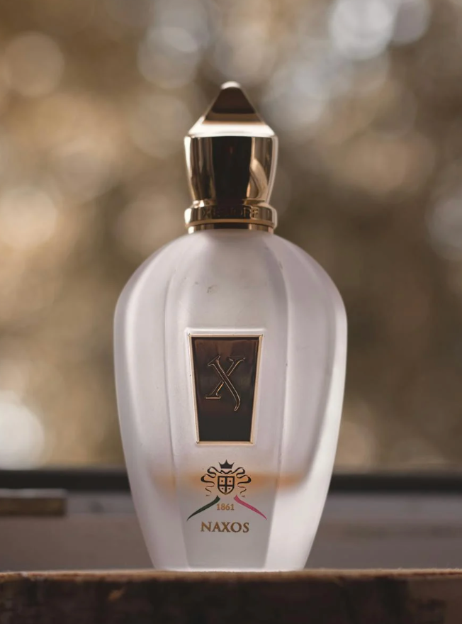 bottle of xerjoff naxos displayed outside
