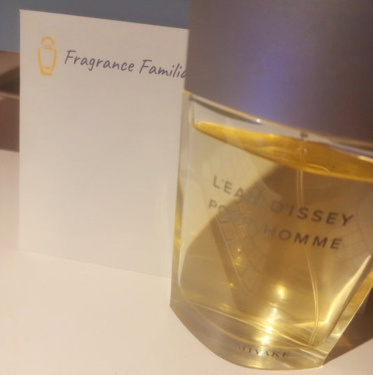 issey miyake cologne placed in front of a fragrance familia branded envelope