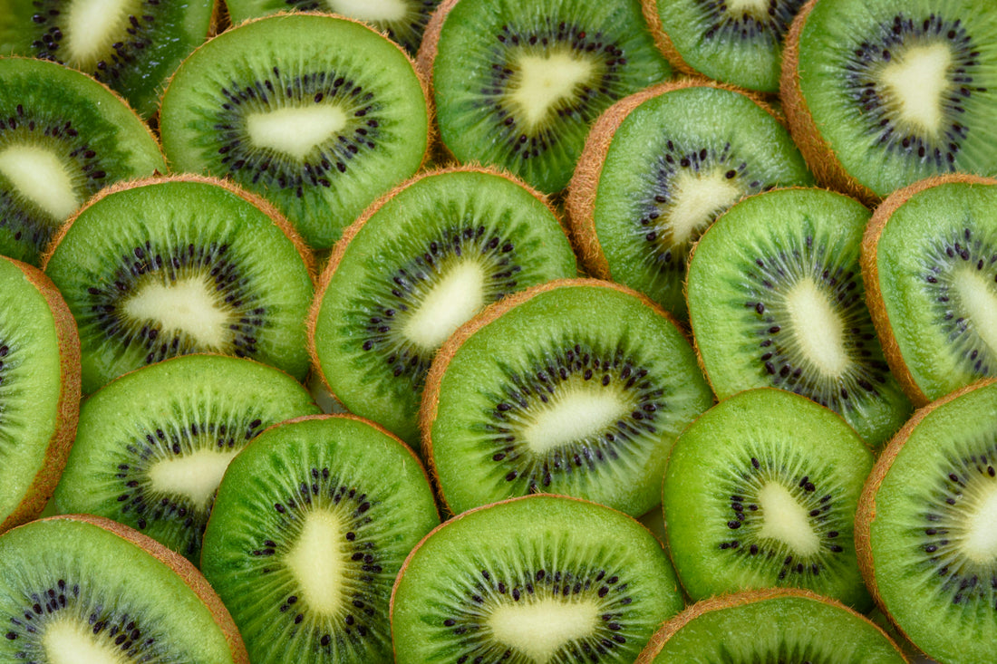 a batch of sliced kiwi fruits