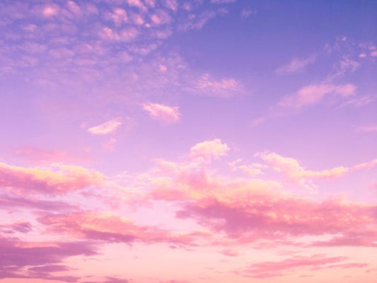 photo of pinks clouds amidst blue sky