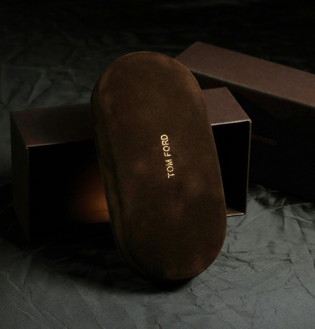 photo of brown tom ford sunglasses case and box behind it